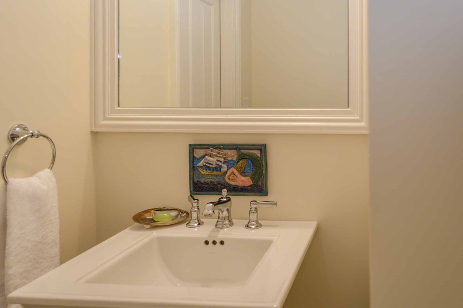 37 Simpsons Lane Edgartown, MA 02539 - Photo 11 of 28 a bathroom with a sink and a mirror