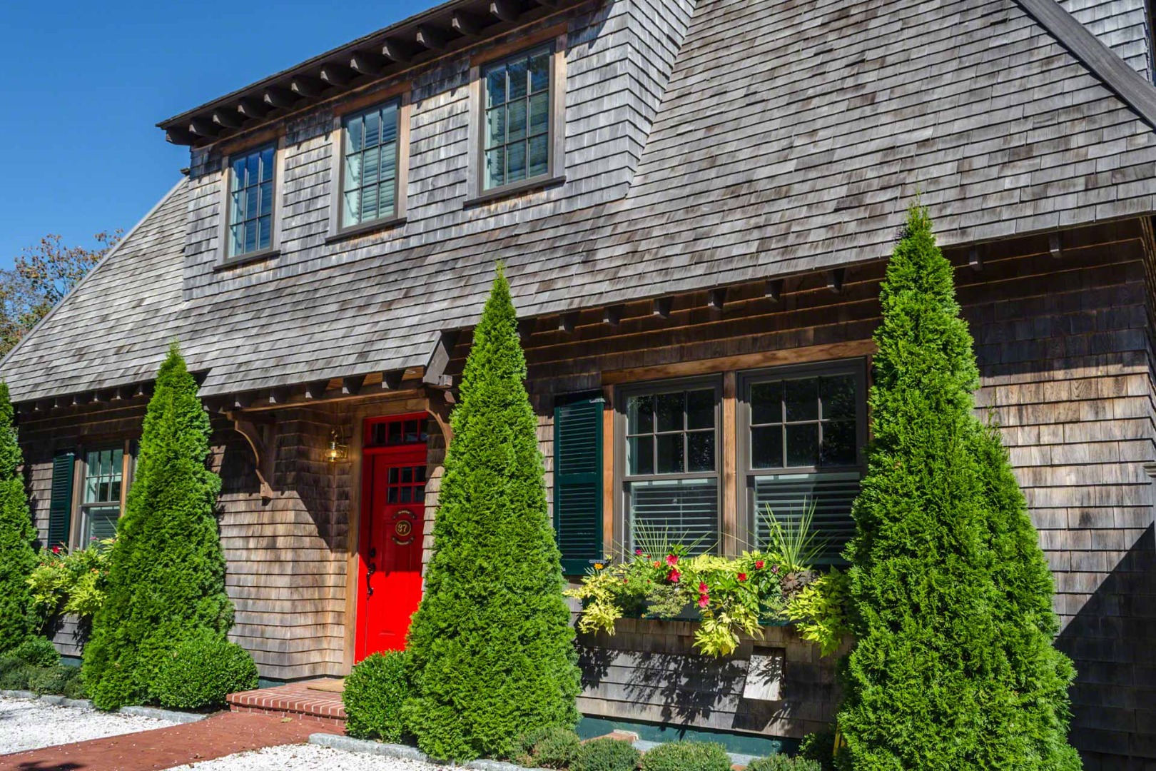 37 Simpsons Lane Edgartown, MA 02539 - Photo 24 of 28 front view of house with potted plants
