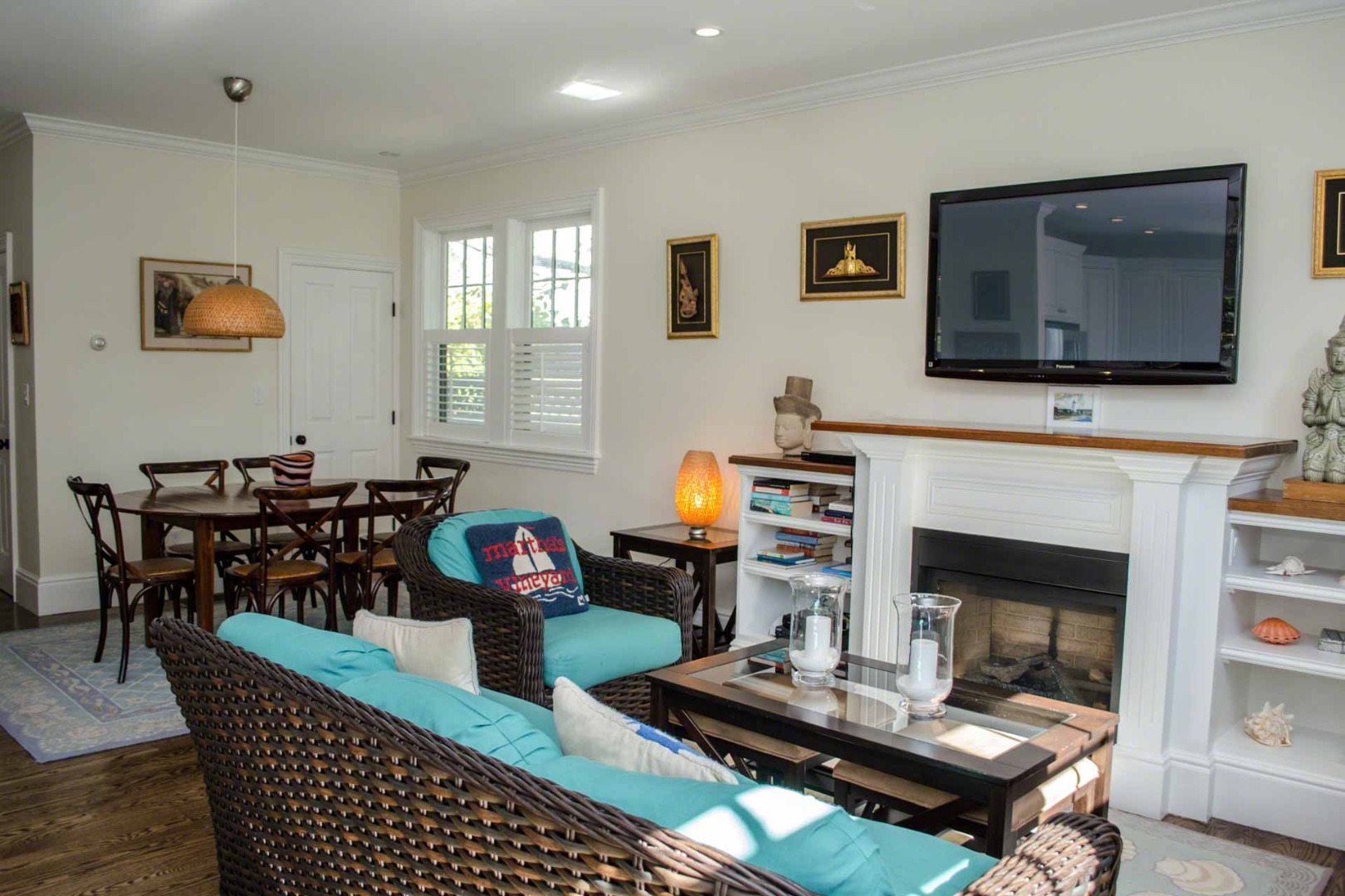 37 Simpsons Lane Edgartown, MA 02539 - Photo 4 of 28 a living room with furniture a flat screen tv and a fireplace