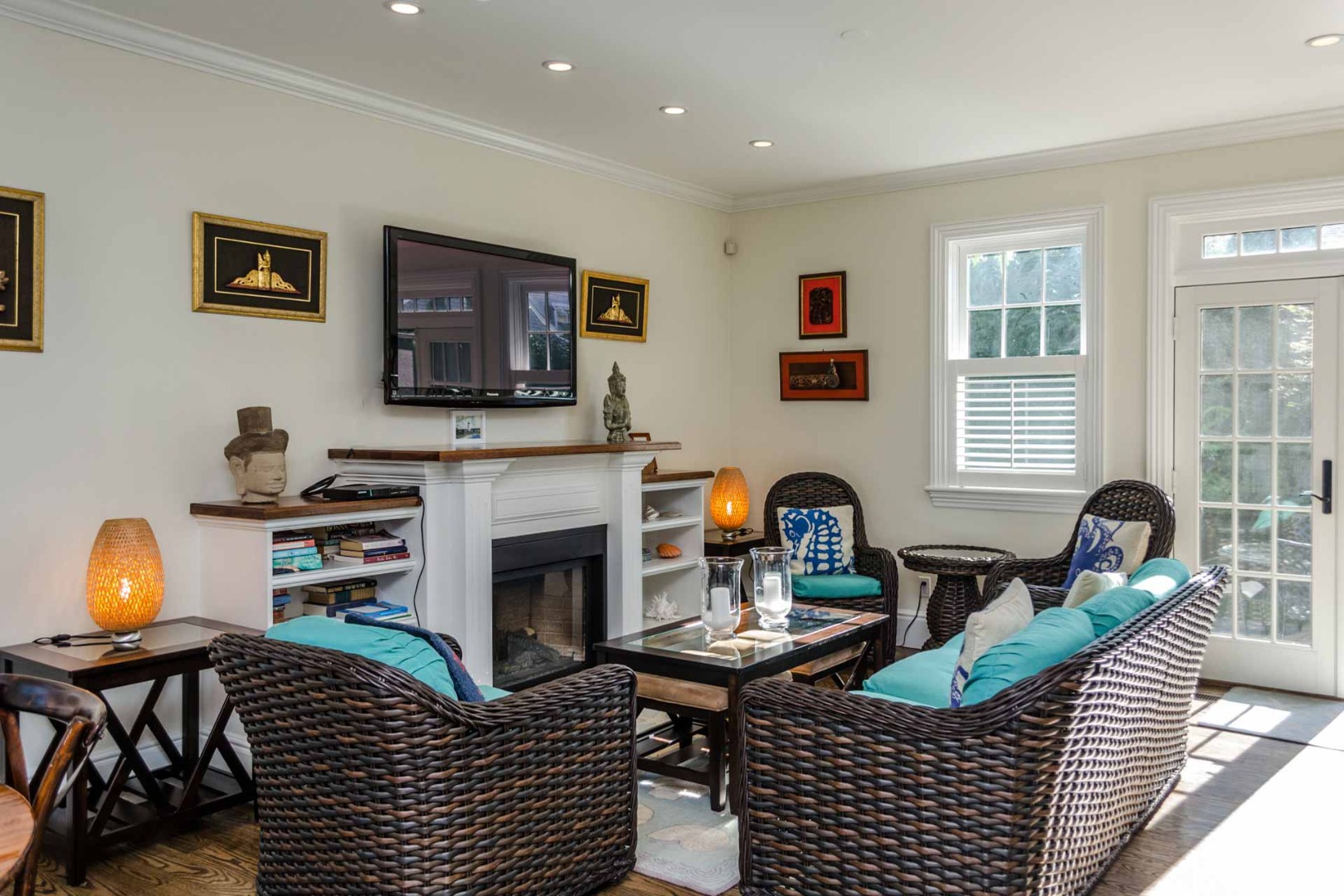 37 Simpsons Lane Edgartown, MA 02539 - Photo 5 of 28 a living room with furniture a fireplace and a flat screen tv