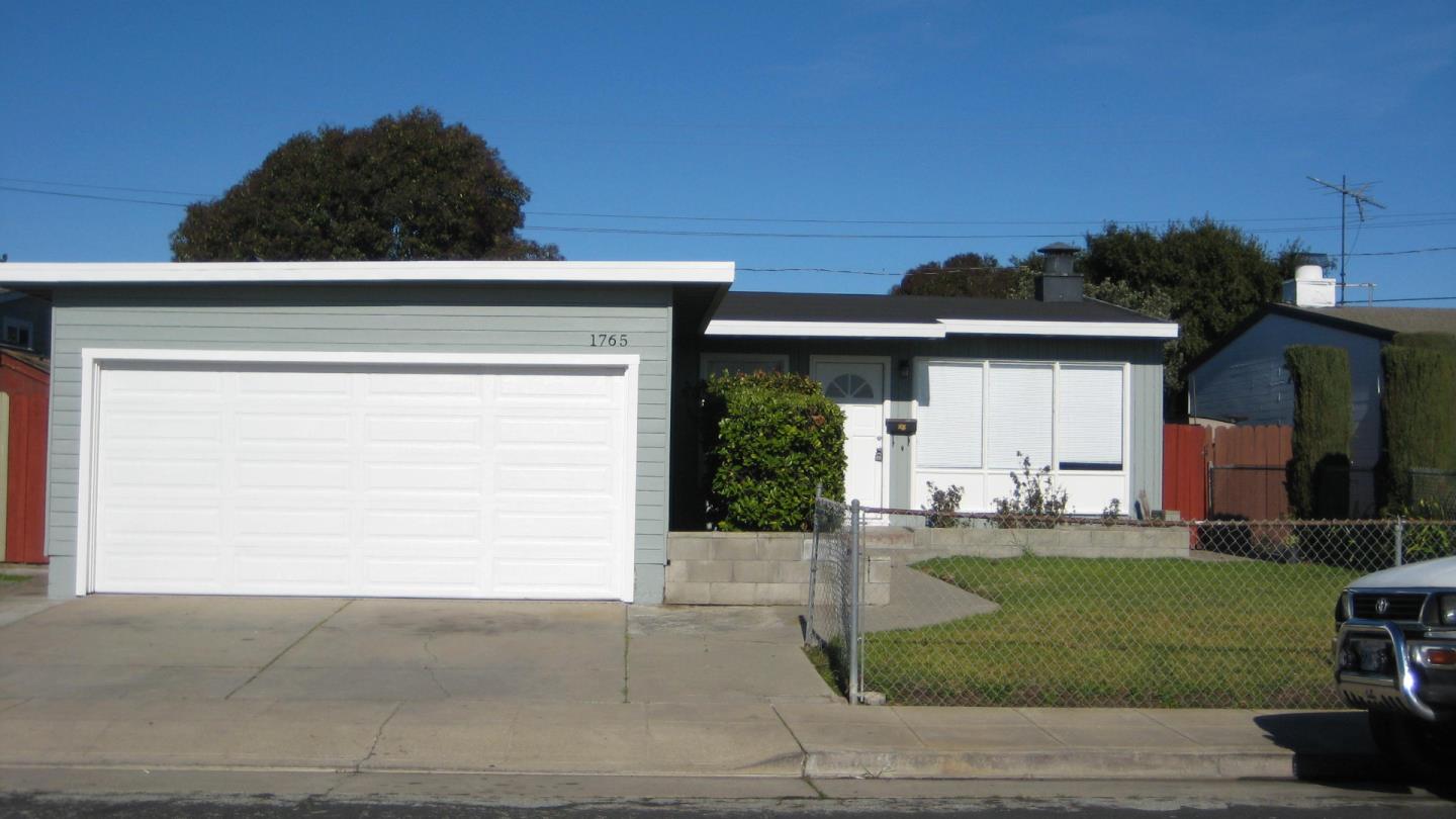 1765 Royal Avenue San Mateo, CA 94401 - Photo 1 of 16 a front view of a house with a yard