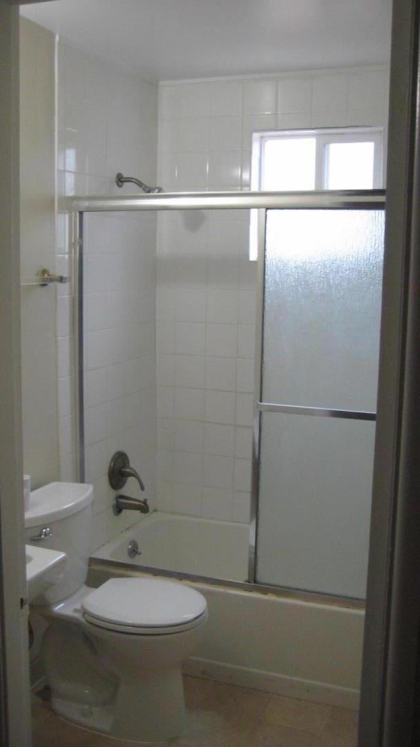 1765 Royal Avenue San Mateo, CA 94401 - Photo 11 of 16 a bathroom with a shower and a toilet
