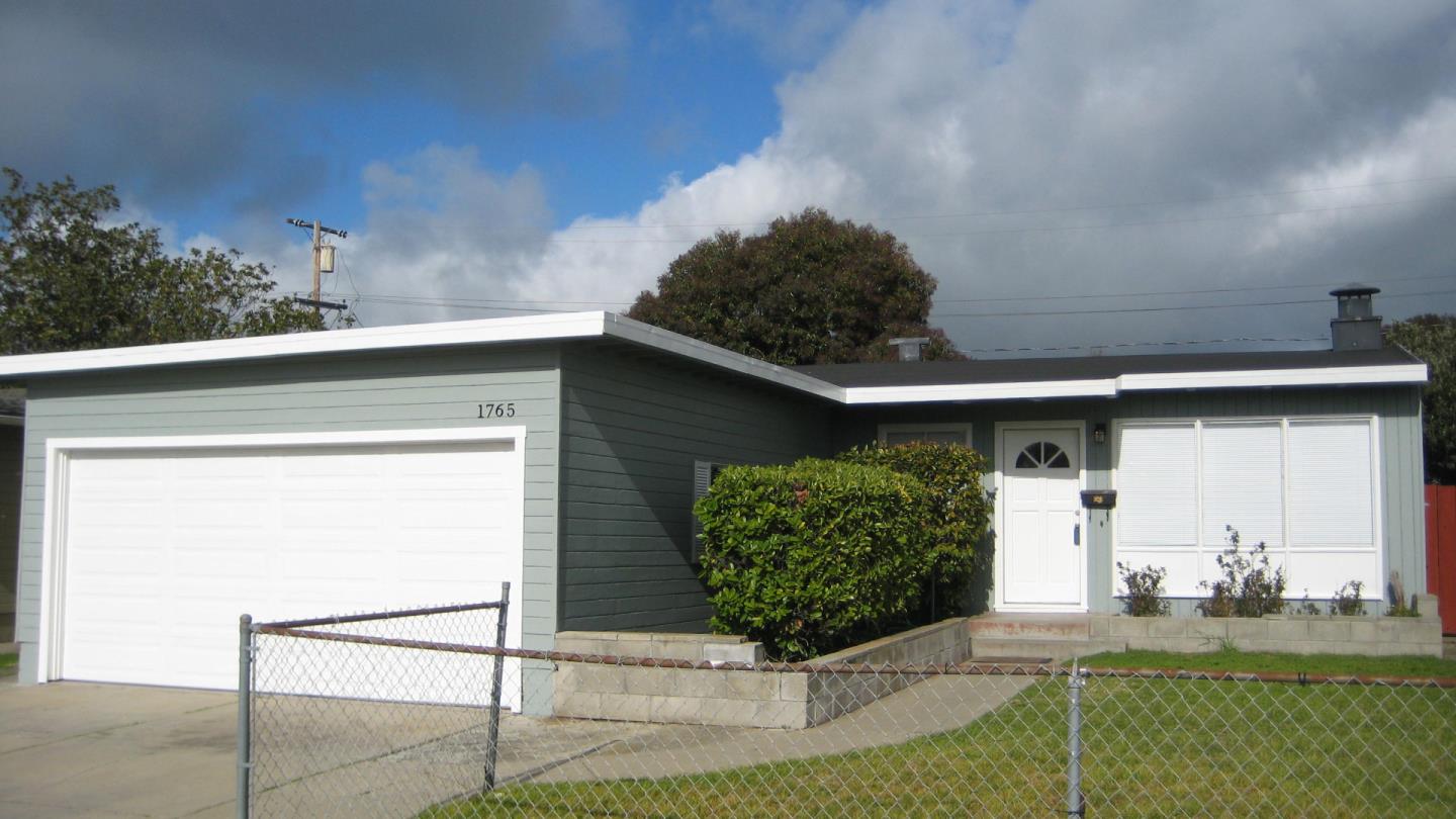 1765 Royal Avenue San Mateo, CA 94401 - Photo 2 of 16 a front view of a house with garden