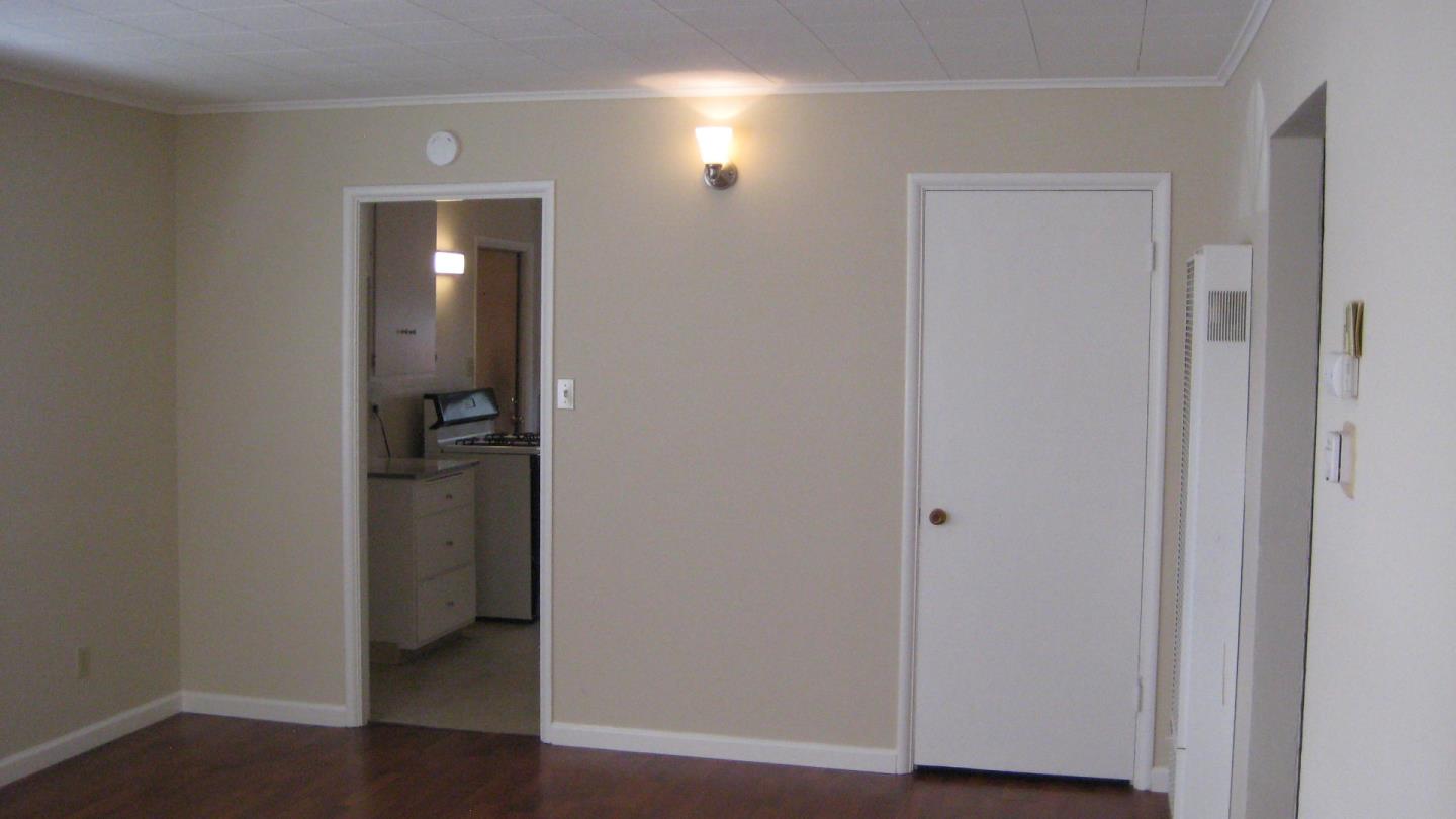 1765 Royal Avenue San Mateo, CA 94401 - Photo 5 of 16 an empty room with wooden floor and closet
