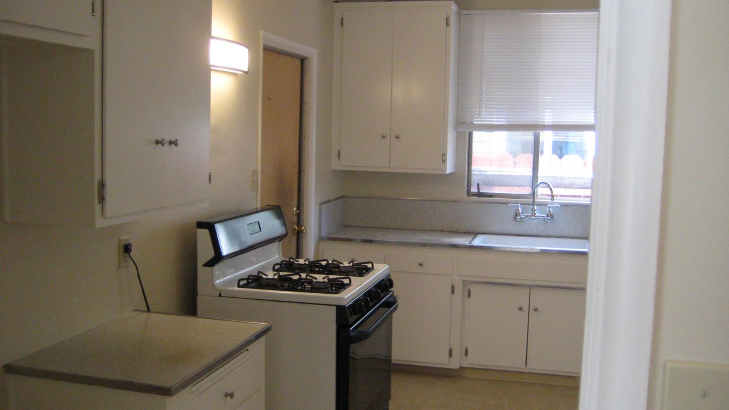 1765 Royal Avenue San Mateo, CA 94401 - Photo 6 of 16 a kitchen with a stove and a sink