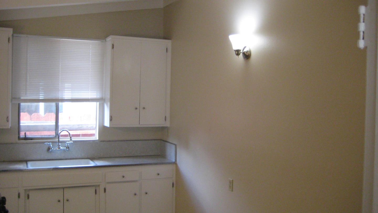 1765 Royal Avenue San Mateo, CA 94401 - Photo 7 of 16 a bathroom with a sink and a mirror