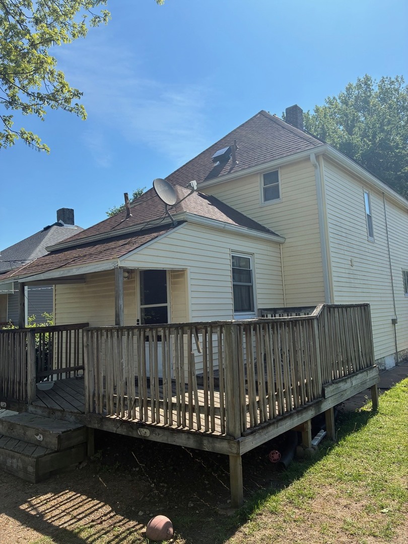 19 South 52nd Street Belleville, IL 62226 - Photo 7 of 7 a view of a wooden deck and a yard