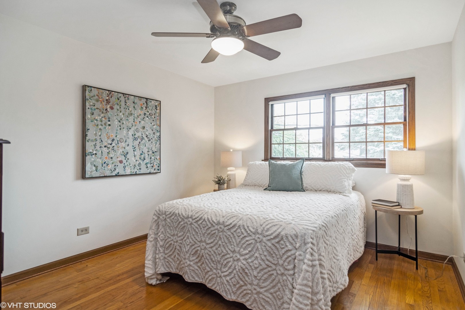 174 Lance Drive Des Plaines, IL 60016 - Photo 11 of 25 a bedroom with a bed and wooden floor