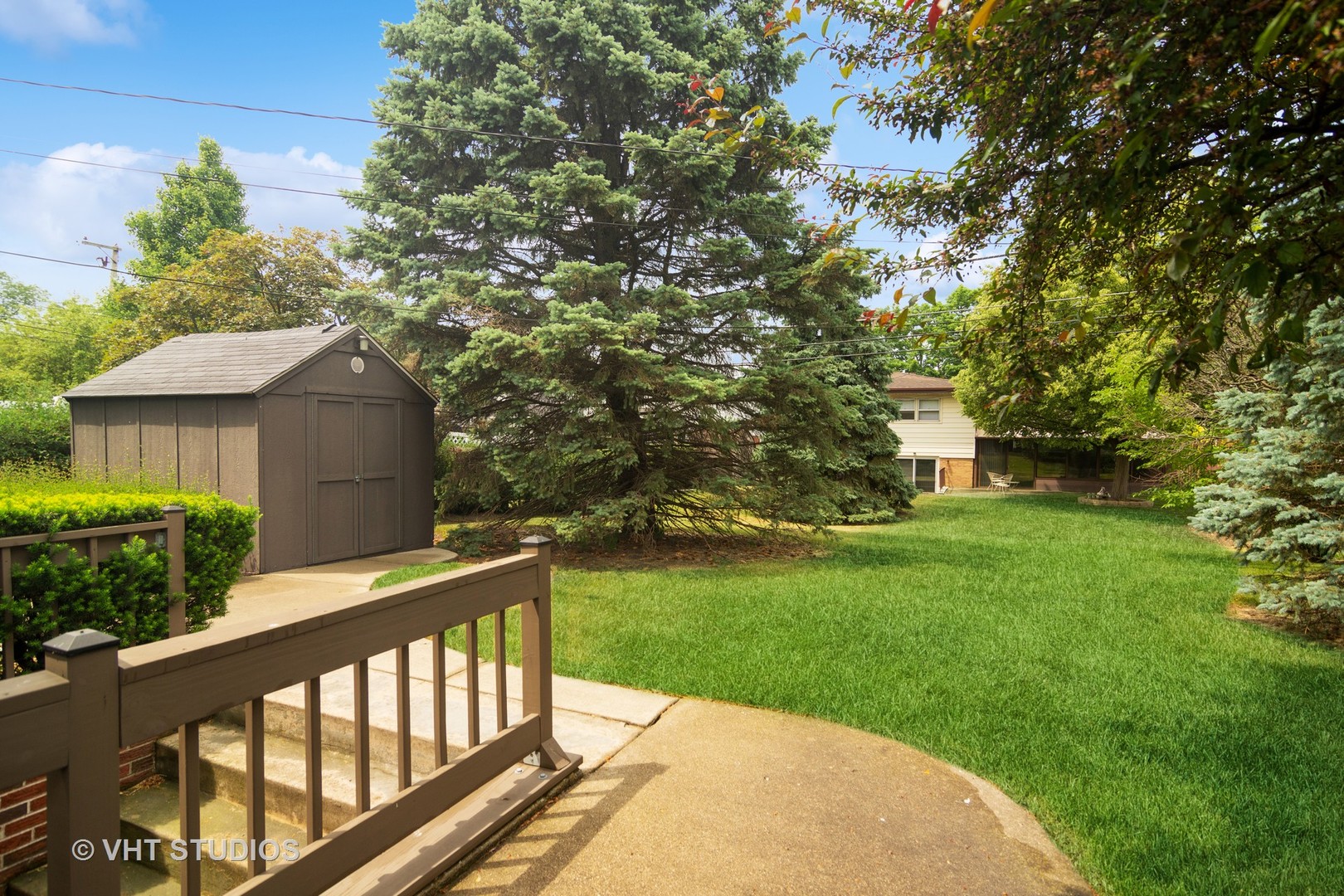 174 Lance Drive Des Plaines, IL 60016 - Photo 19 of 25 a view of a wooden deck and a backyard