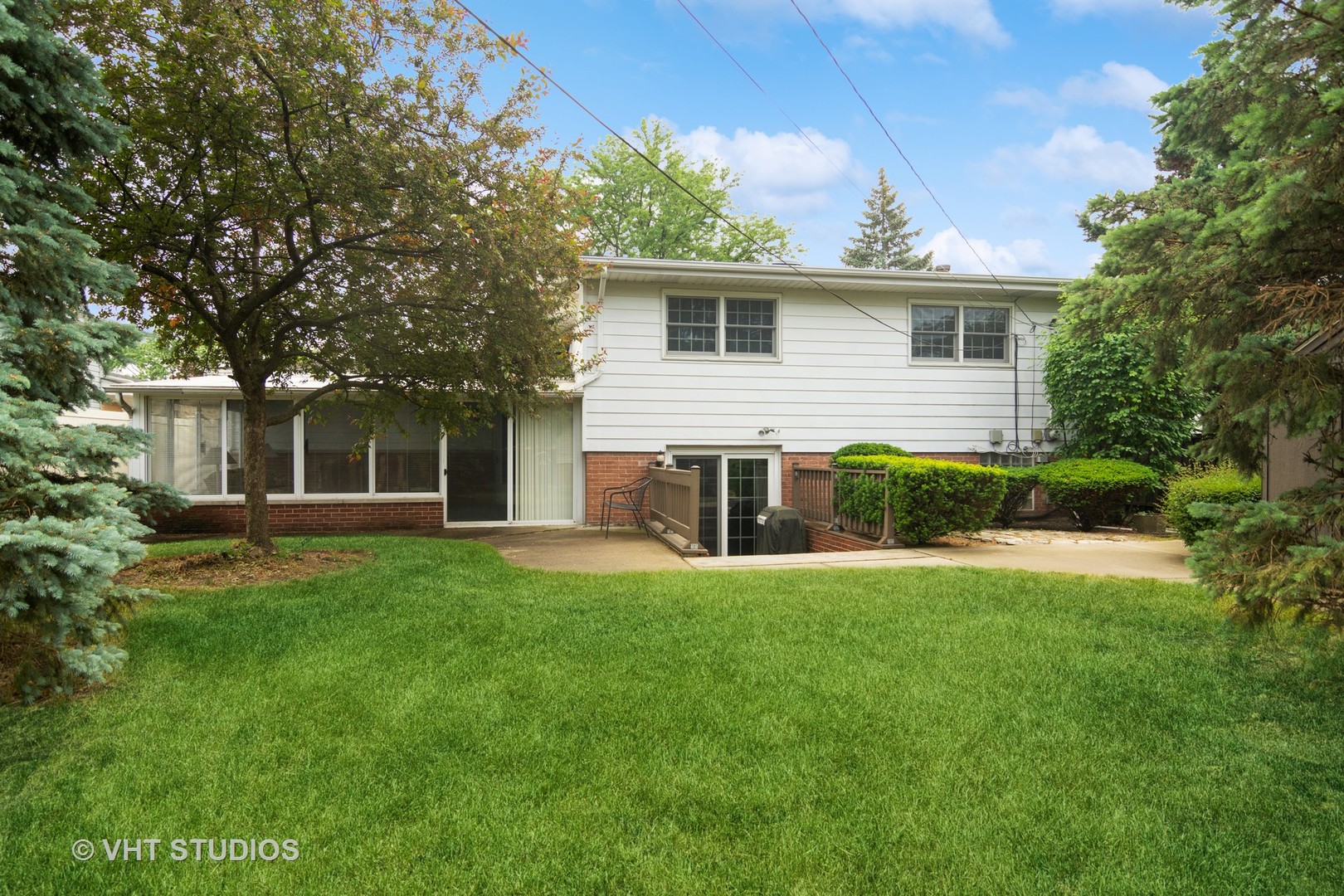 174 Lance Drive Des Plaines, IL 60016 - Photo 20 of 25 a view of a house with a backyard