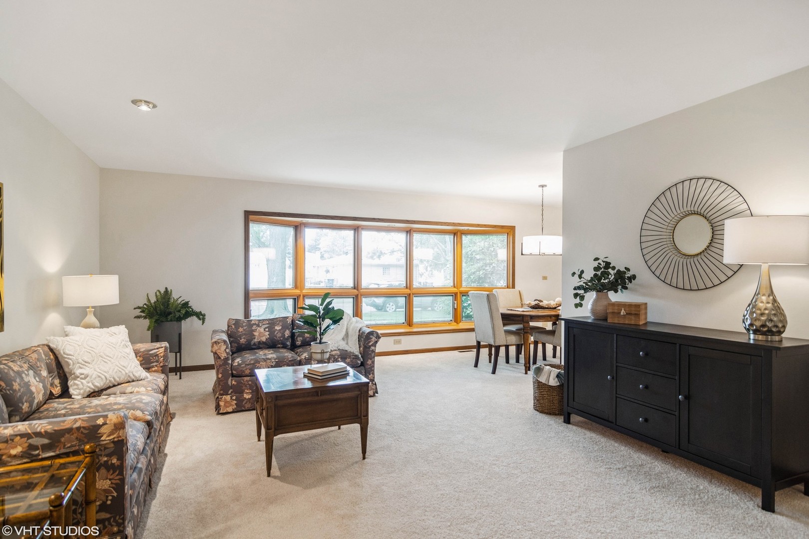 174 Lance Drive Des Plaines, IL 60016 - Photo 2 of 25 a living room with furniture and a large window