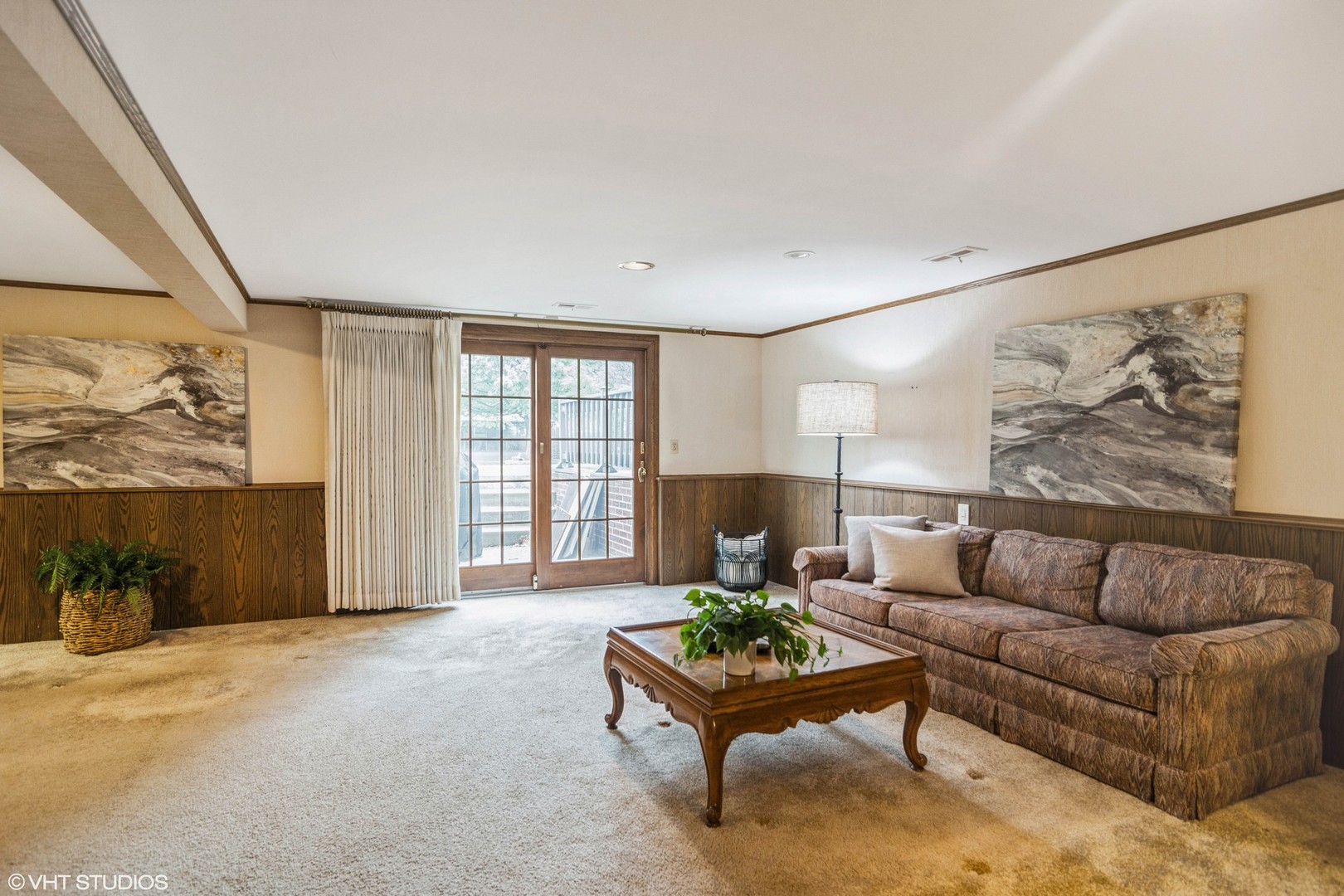 174 Lance Drive Des Plaines, IL 60016 - Photo 8 of 25 a living room with furniture and a large window