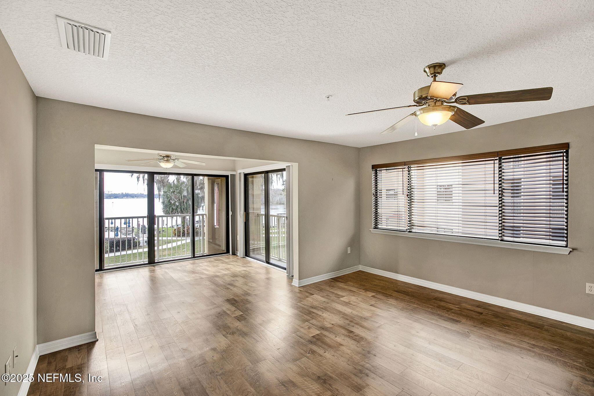 99 Broad River Place, Unit 2201 Welaka, FL 32193 - Photo 8 of 42 Living Roo/ Sunroomm