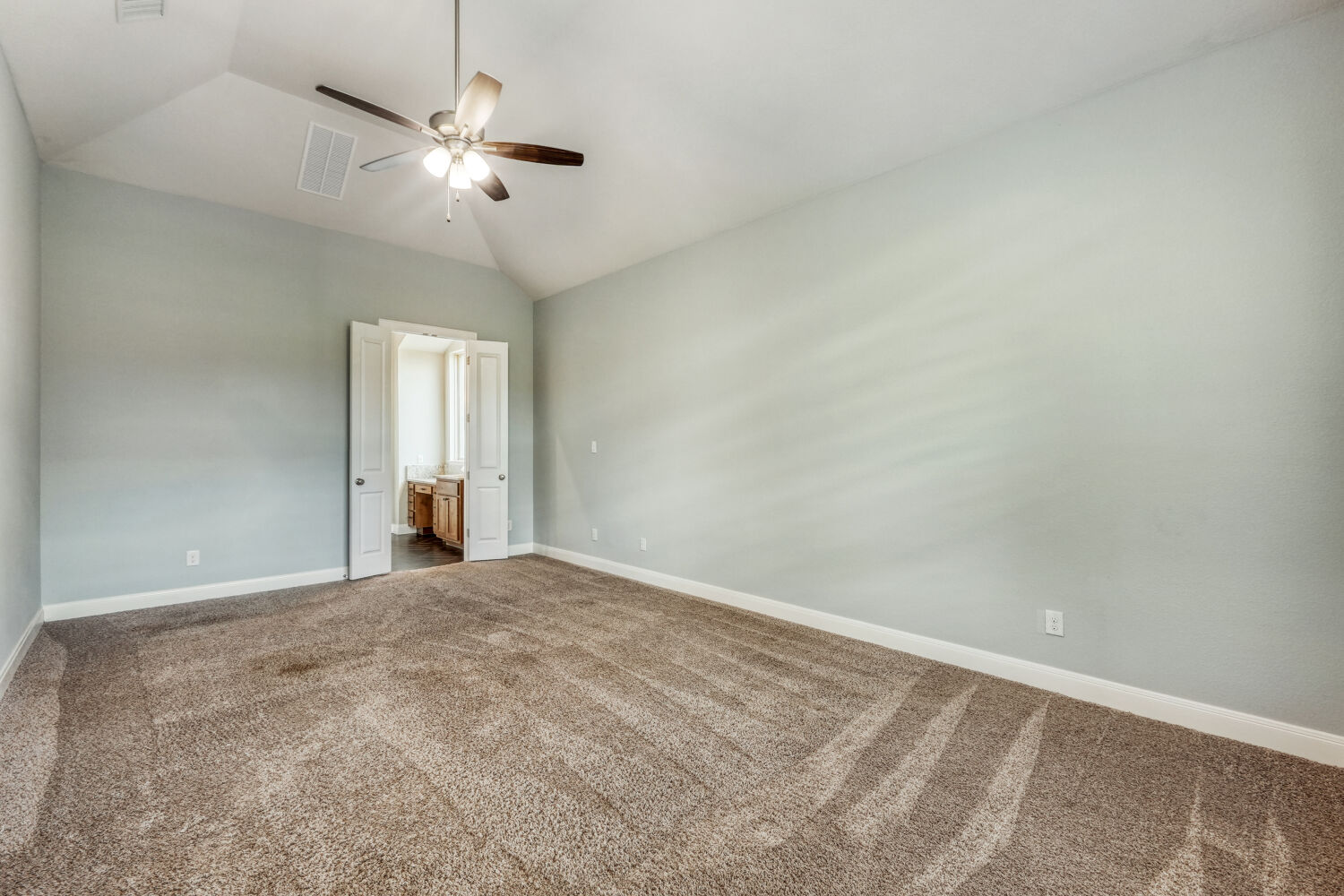 1401 Calago Cove Leander, TX 78641 - Photo 13 of 40 an empty room with chandelier fan