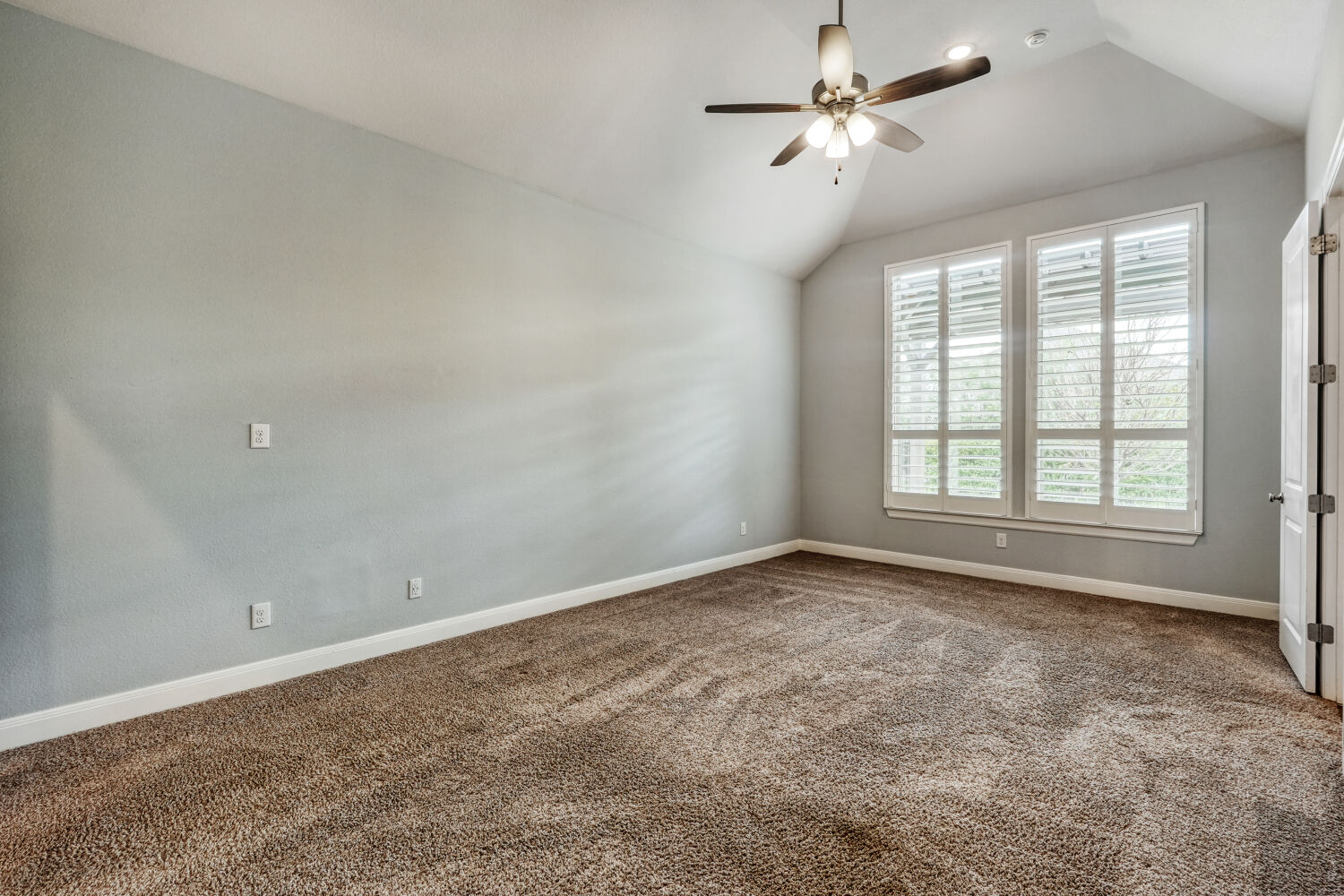 1401 Calago Cove Leander, TX 78641 - Photo 15 of 40 a view of a room with a window and a ceiling fan