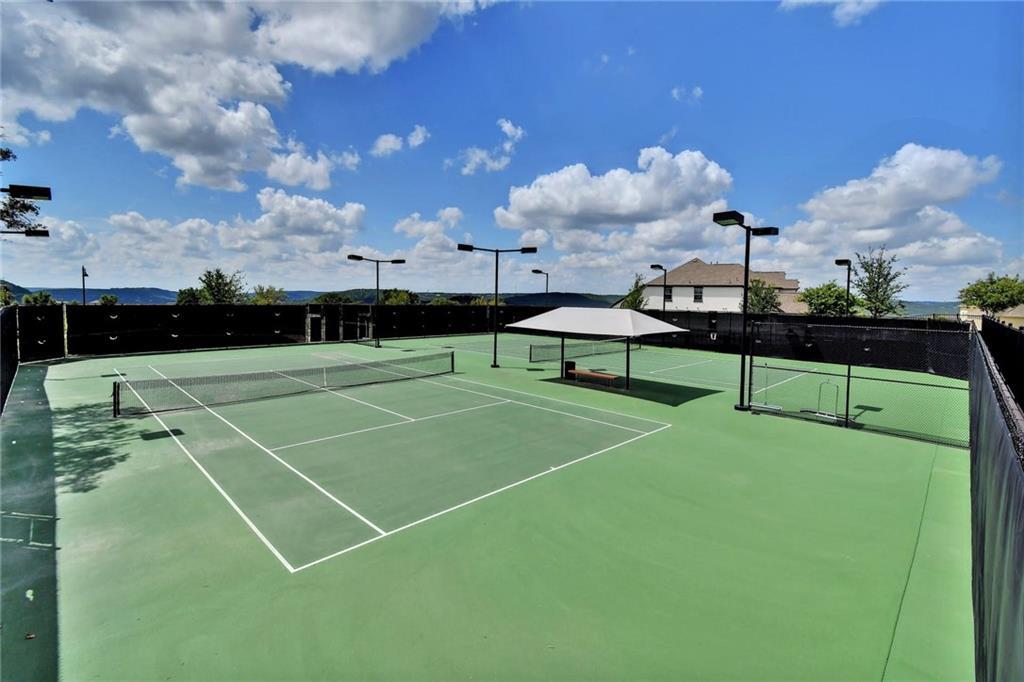1401 Calago Cove Leander, TX 78641 - Photo 36 of 40 a view of a tennis court