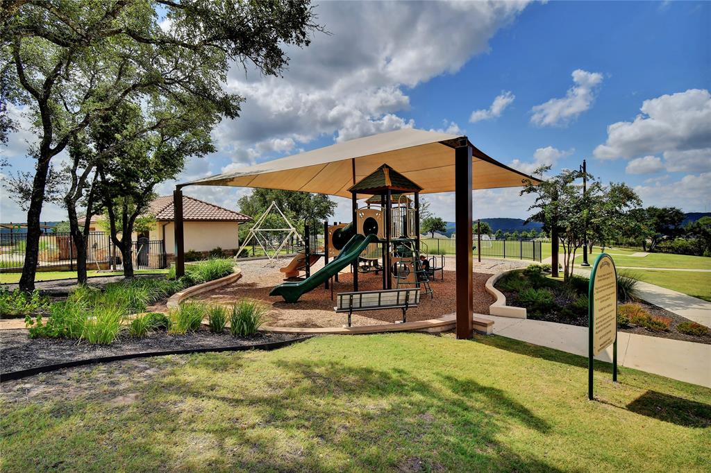 1401 Calago Cove Leander, TX 78641 - Photo 40 of 40 a view of a house with backyard and porch