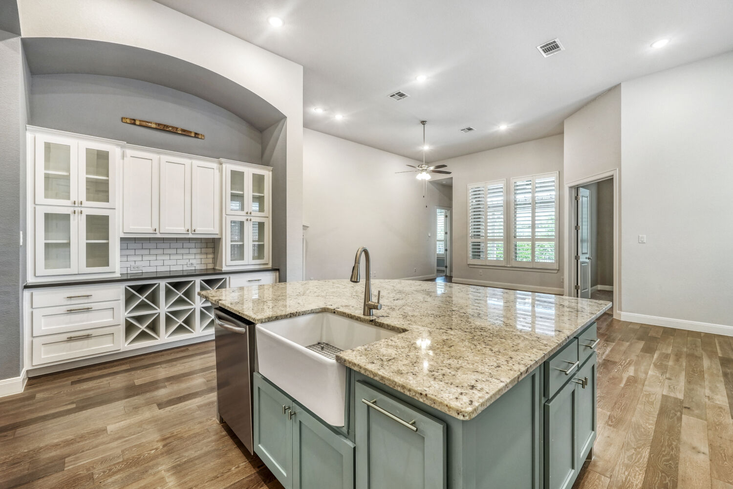 1401 Calago Cove Leander, TX 78641 - Photo 10 of 40 a kitchen with stainless steel appliances granite countertop a sink stove and cabinets