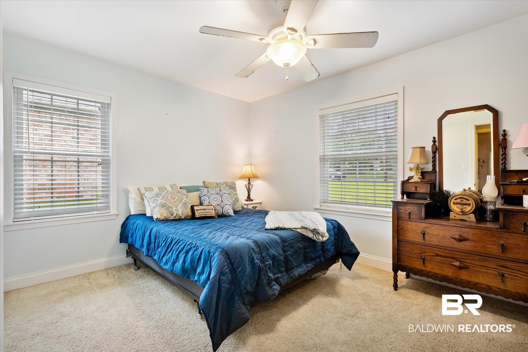558 Stuart Street Daphne, AL 36526 - Photo 15 of 29 Bedroom featuring light carpet and ceiling fan