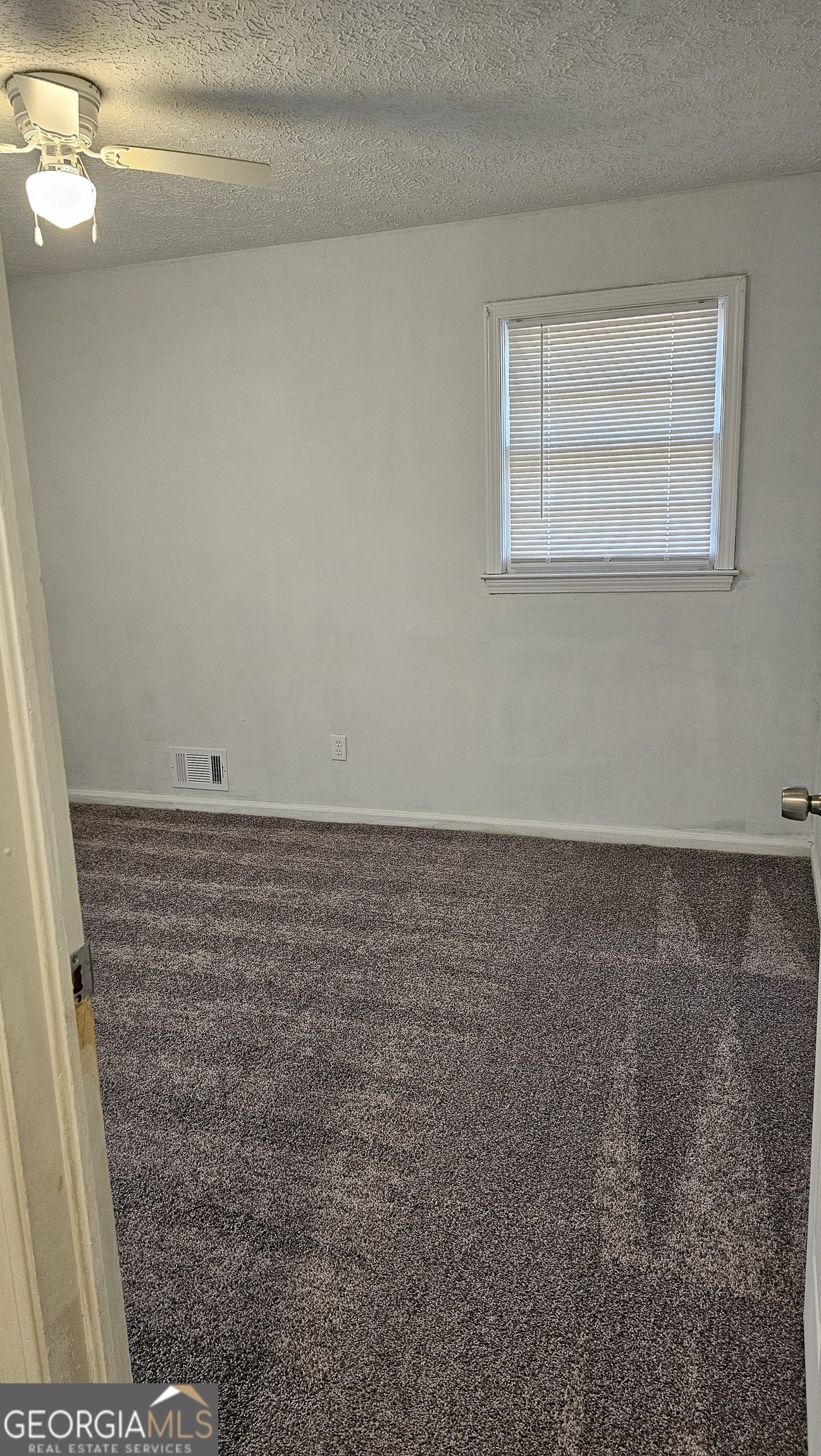 10167 Waterford Road Northeast Covington, GA 30014 - Photo 18 of 20 a view of room with window