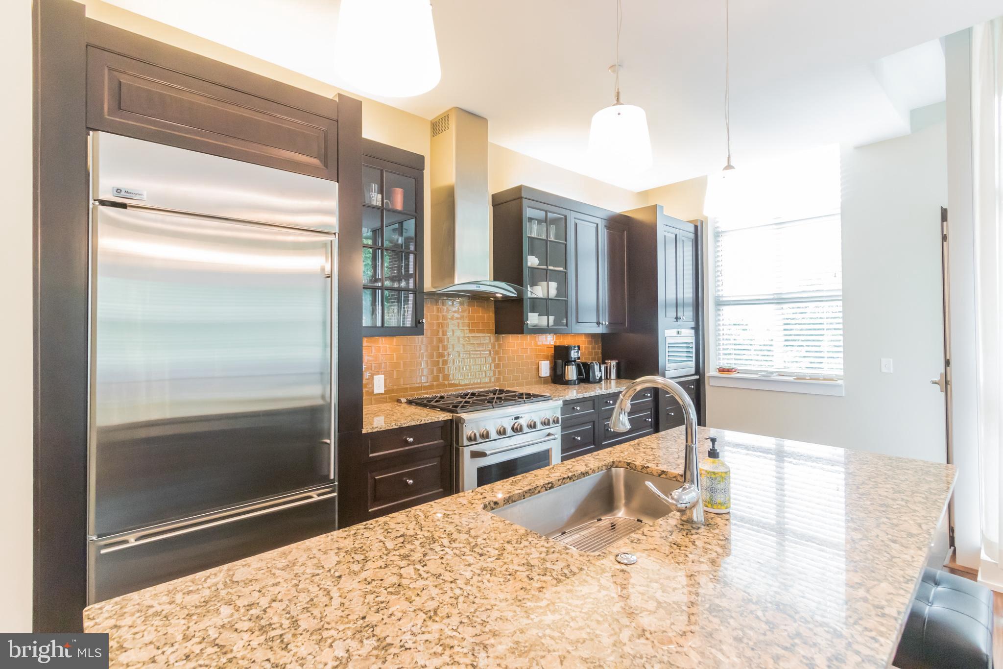 132 Iron Works Way, Unit B Wayne, PA 19087 - Photo 15 of 36 Large Granite Counter Top Island