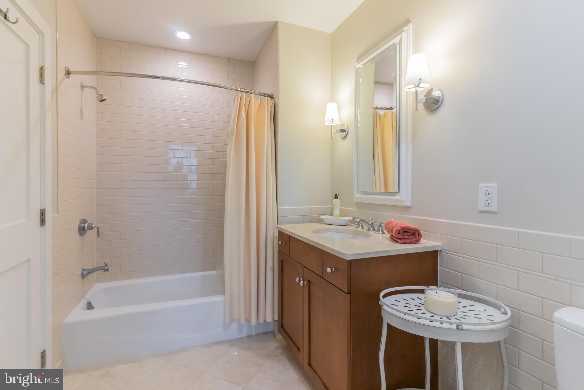 132 Iron Works Way, Unit B Wayne, PA 19087 - Photo 34 of 36 Marble tiled second bathroom