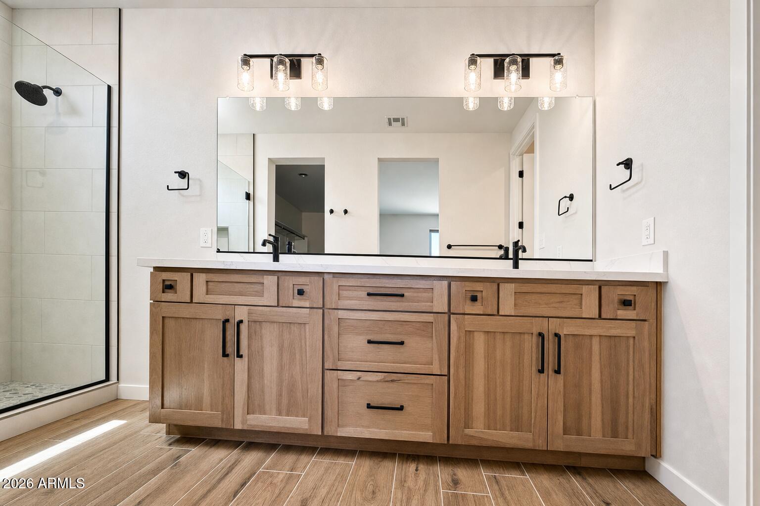 16957 East Bobwhite Way Rio Verde, AZ 85263 - Photo 18 of 25 a bathroom with a sink a mirror and a cabinets