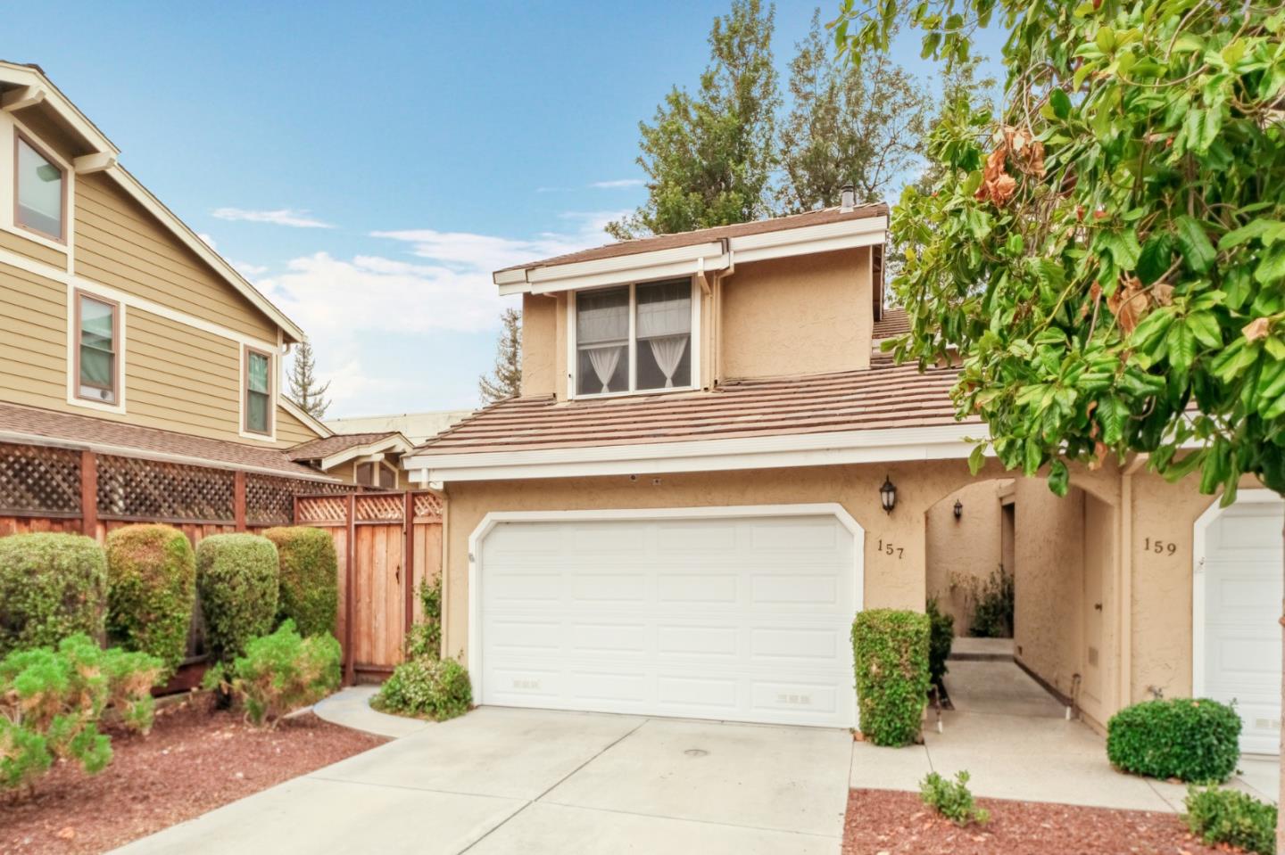157 Redding Road Campbell, CA 95008 - Photo 2 of 31 a front view of a house with garden