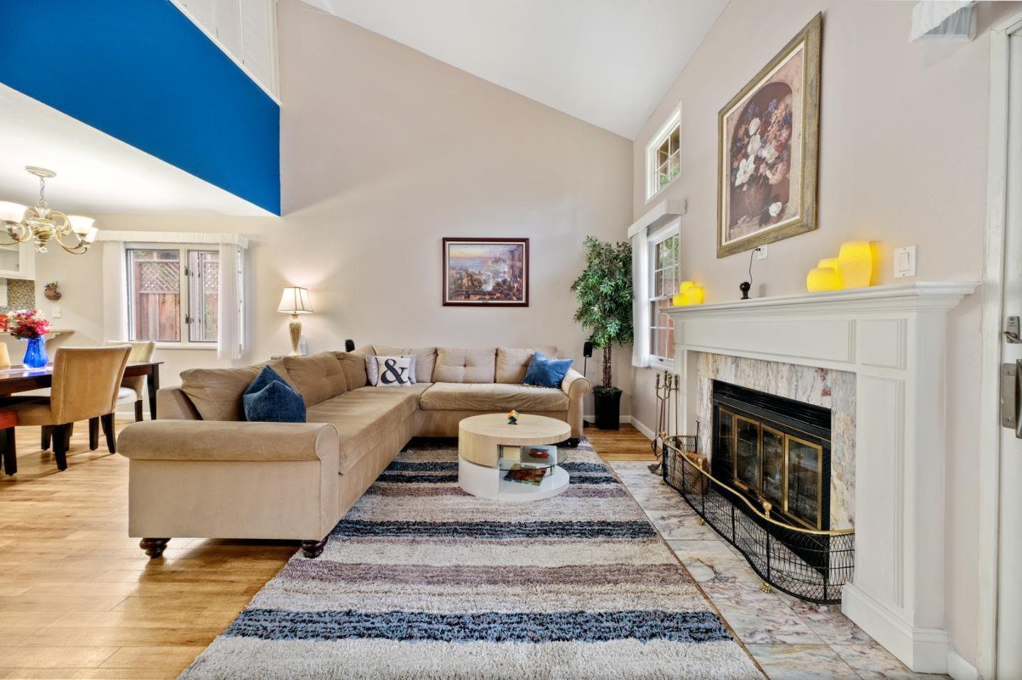 157 Redding Road Campbell, CA 95008 - Photo 11 of 31 a living room with furniture a rug and a fireplace
