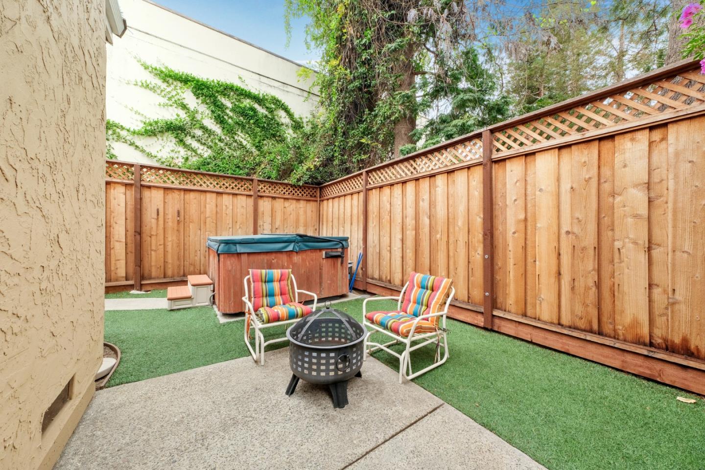 157 Redding Road Campbell, CA 95008 - Photo 15 of 31 a backyard of a house with table and chairs
