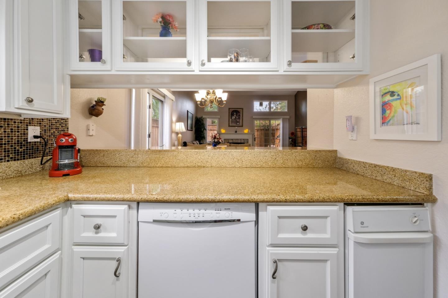 157 Redding Road Campbell, CA 95008 - Photo 7 of 31 a kitchen with cabinets appliances and a counter top space
