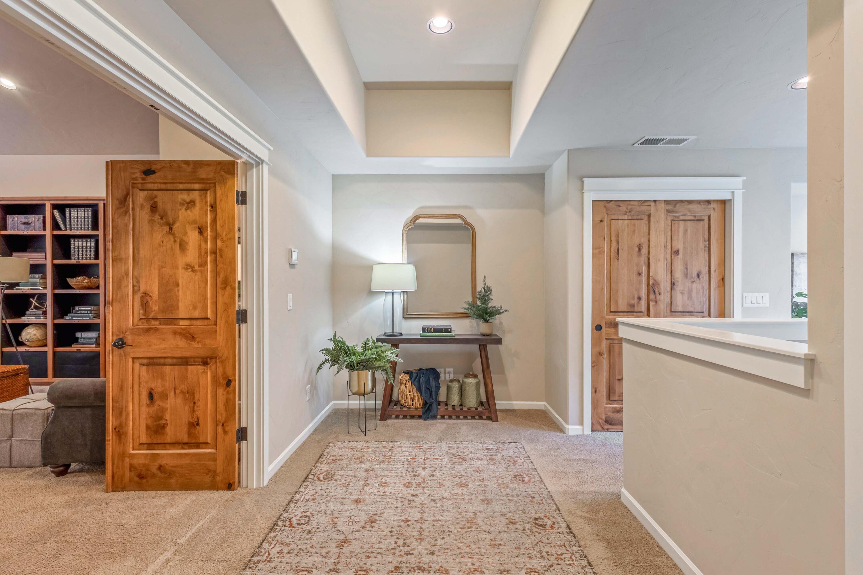 20870 Golden Gate Place Bend, OR 97702 - Photo 19 of 42 Upstairs loft with tray ceiling.