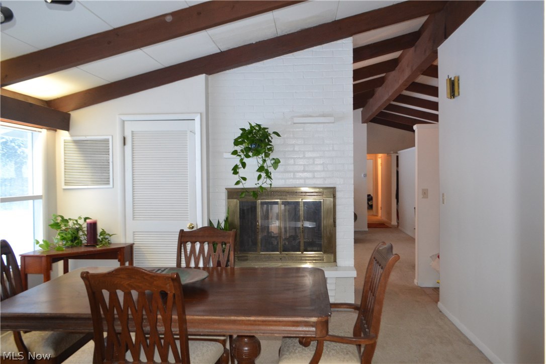 35380 Solon Road Solon, OH 44139 - Photo 8 of 18 Fireplace adds such a coziness to this dining room.