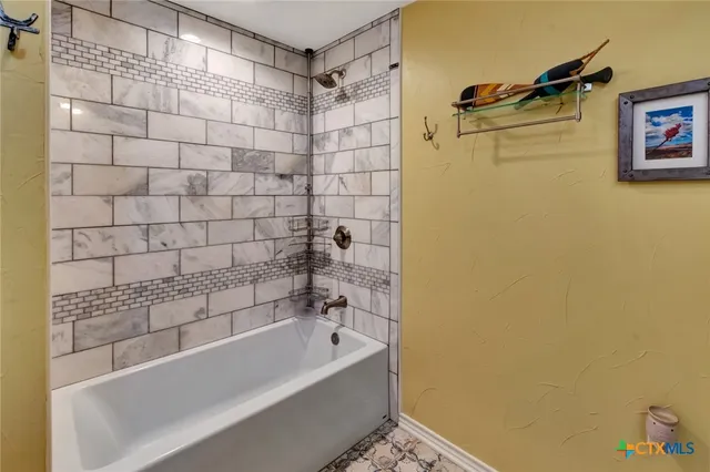 a bathroom with a bathtub