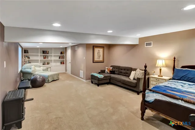 a bedroom with a bed and closet