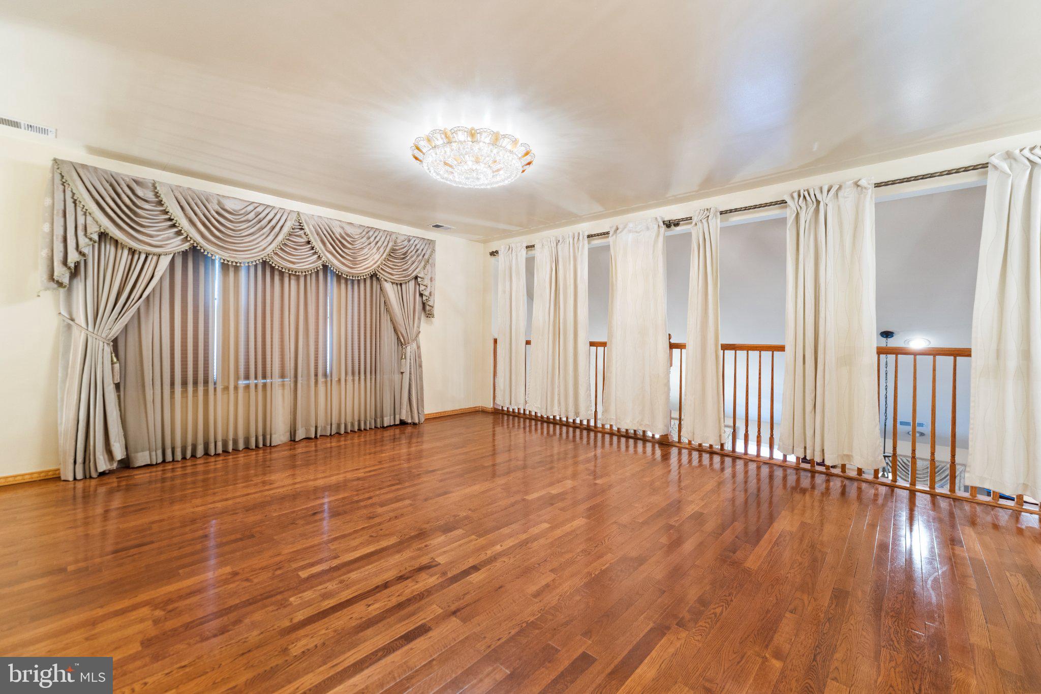 7 Spring Drive Dayton, NJ 08810 - Photo 10 of 24 a view of a room with wooden floor