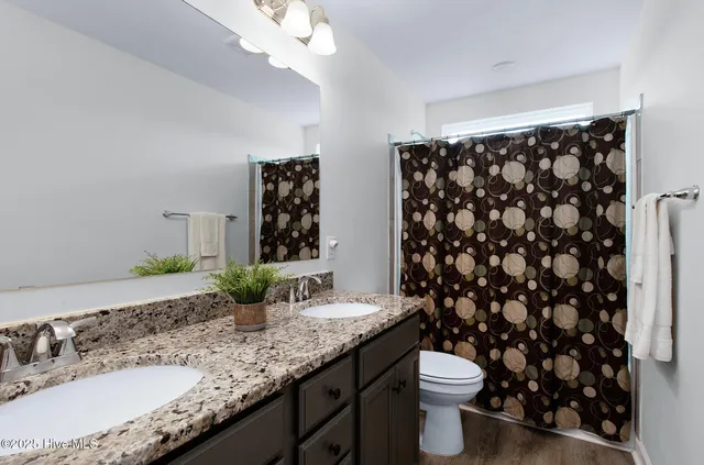 $435,000 | 107 Peletier Shores Drive, Peletier, NC 28584