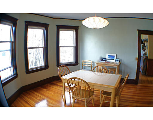 89 Montebello Road, Unit 3 Boston, MA 02130 - Photo 3 of 9 a dining room with furniture and window