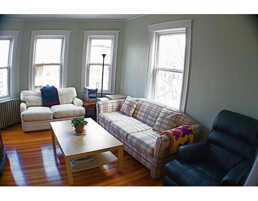 89 Montebello Road, Unit 3 Boston, MA 02130 - Photo 5 of 9 a living room with furniture and a window