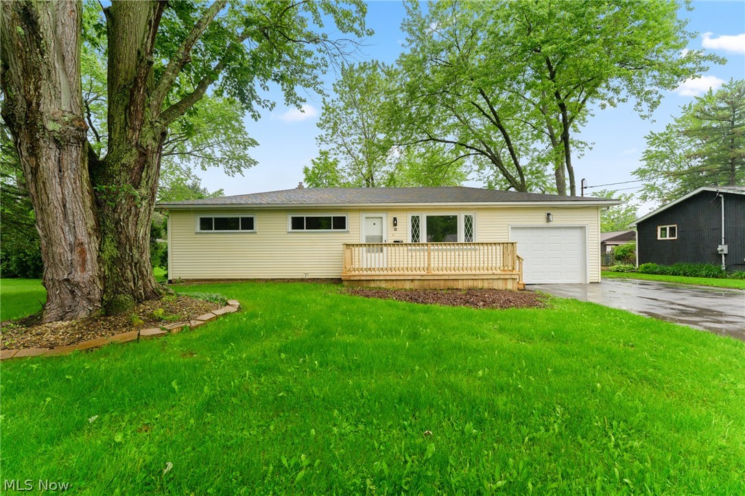 962 Keefer Road Girard, OH 44420 - Photo 1 of 31 Ranch-style home with a garage, a front yard, and a deck