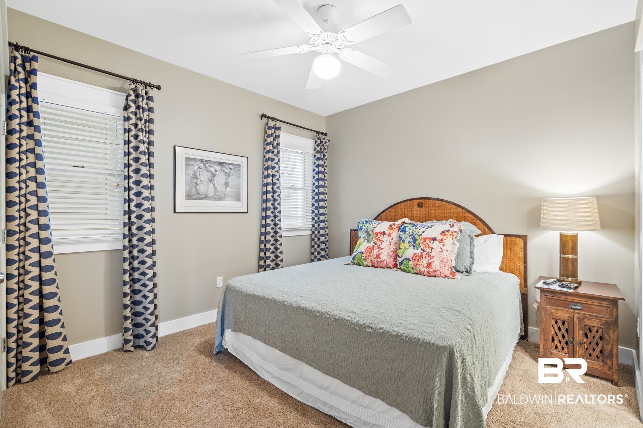 815 Plantation Road, Unit 405 Gulf Shores, AL 36542 - Photo 12 of 39 Bedroom with ceiling fan and light carpet
