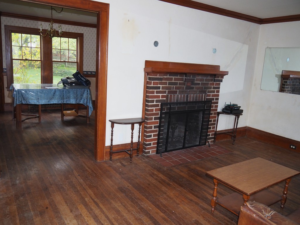 3 Argyle Road Arlington, MA 02476 - Photo 6 of 13 a living room with furniture and a fireplace