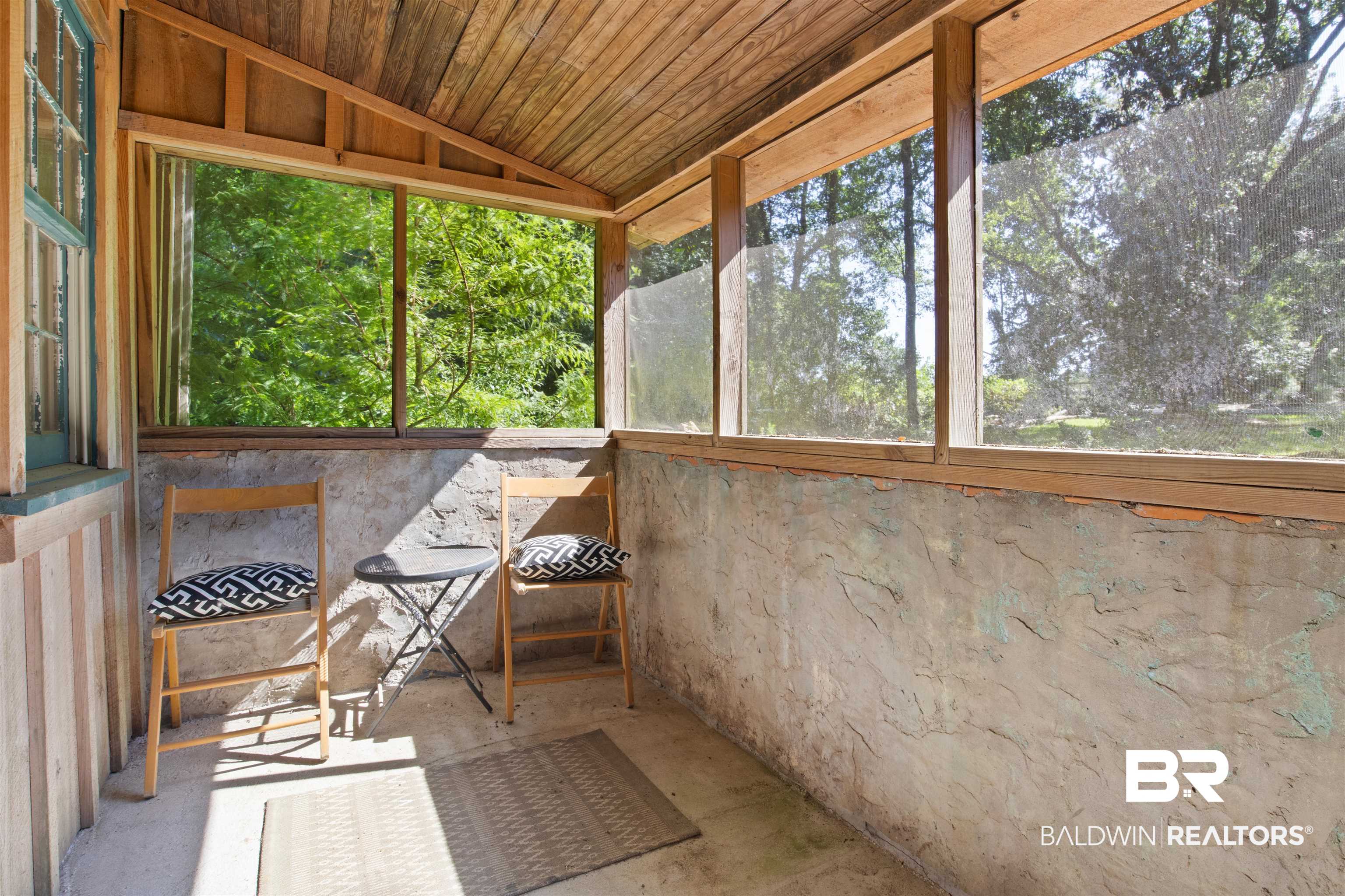 15100 Vasko Road Silverhill, AL 36576 - Photo 28 of 51 Screened porch at Guest Cabin featuring wooden ceiling and vaulted ceiling