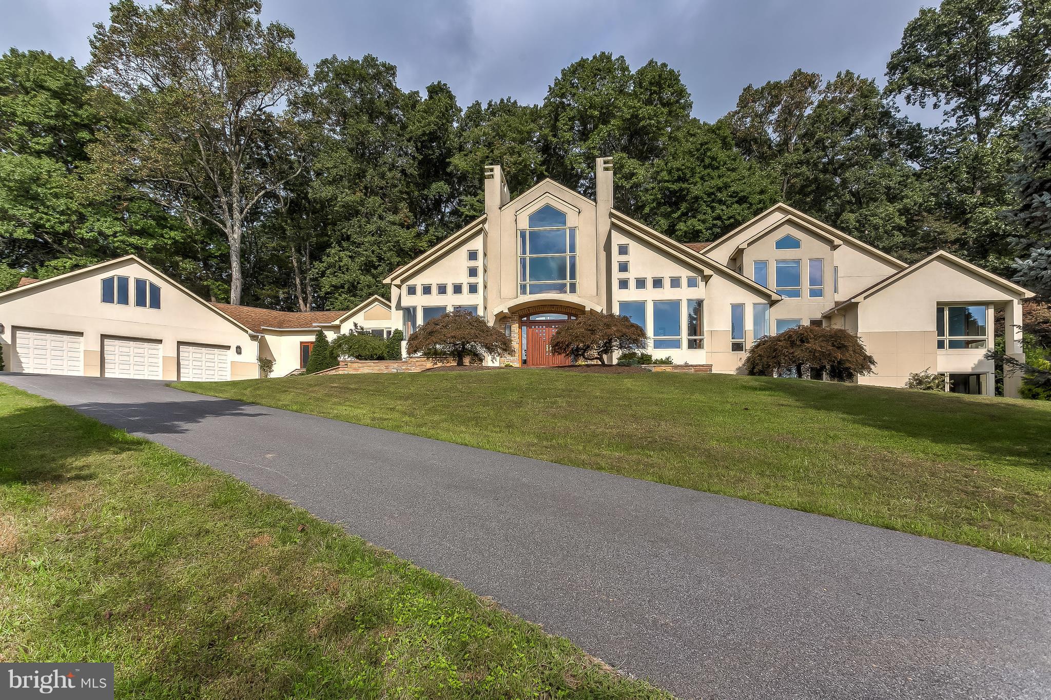 16524 York Road Monkton, MD 21111 - Photo 2 of 33 a front view of a house with a yard and garage
