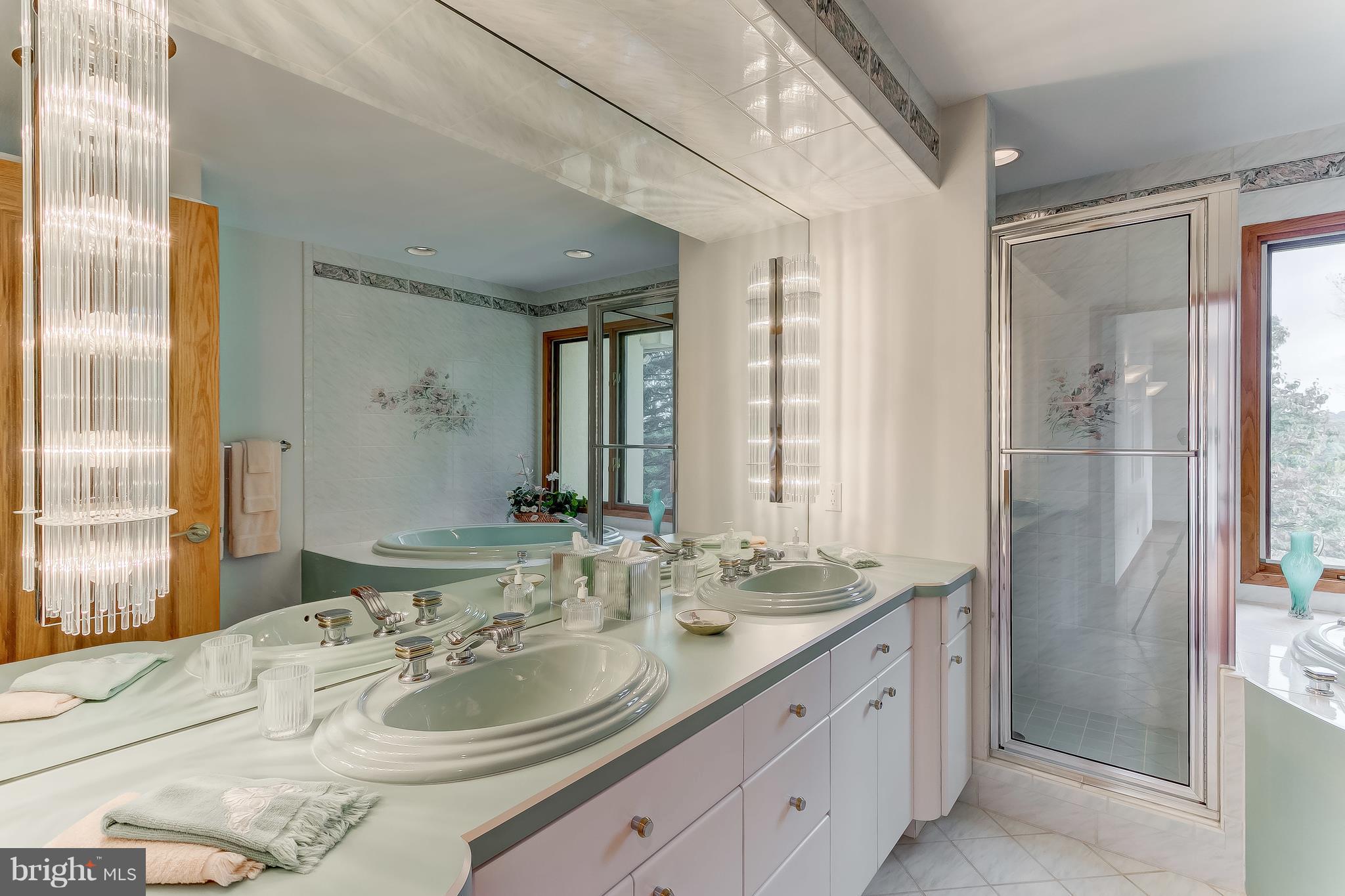 16524 York Road Monkton, MD 21111 - Photo 21 of 33 a bathroom with a granite countertop double vanity sink and a mirror