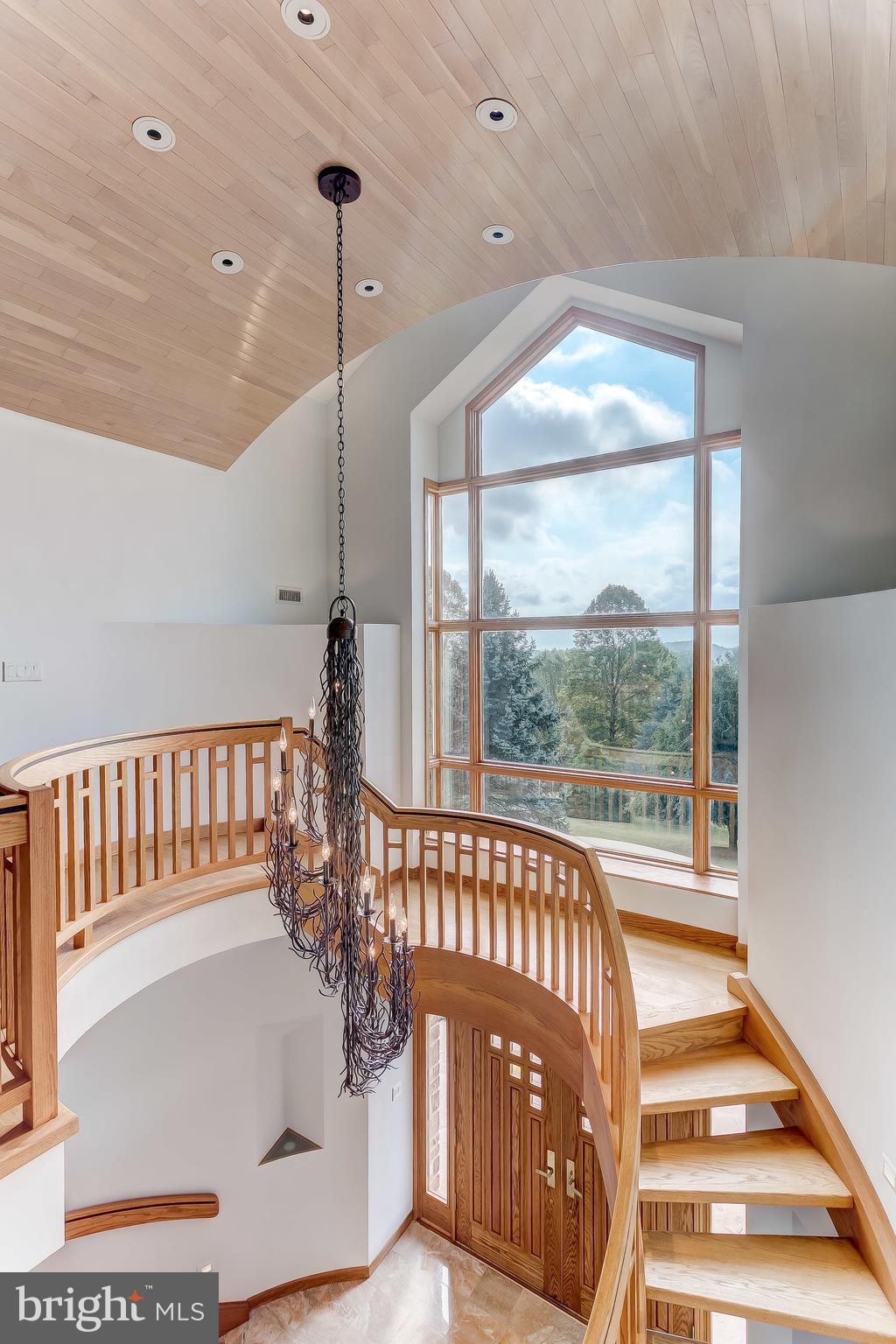 16524 York Road Monkton, MD 21111 - Photo 22 of 33 a view of staircase with a large window and wooden floor