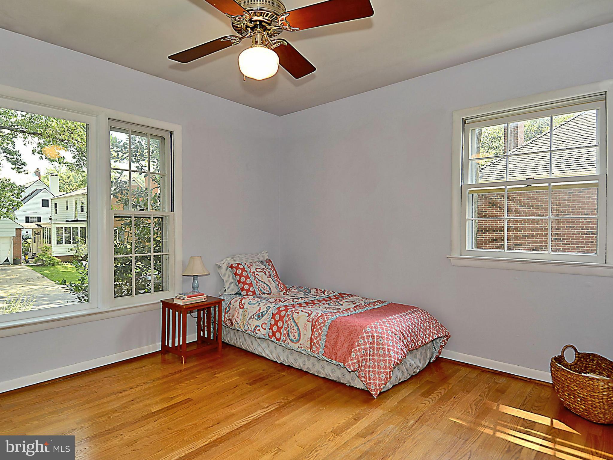 209 MacArthur Road Alexandria, VA 22305 - Photo 13 of 26 a bed room with a bed and a window
