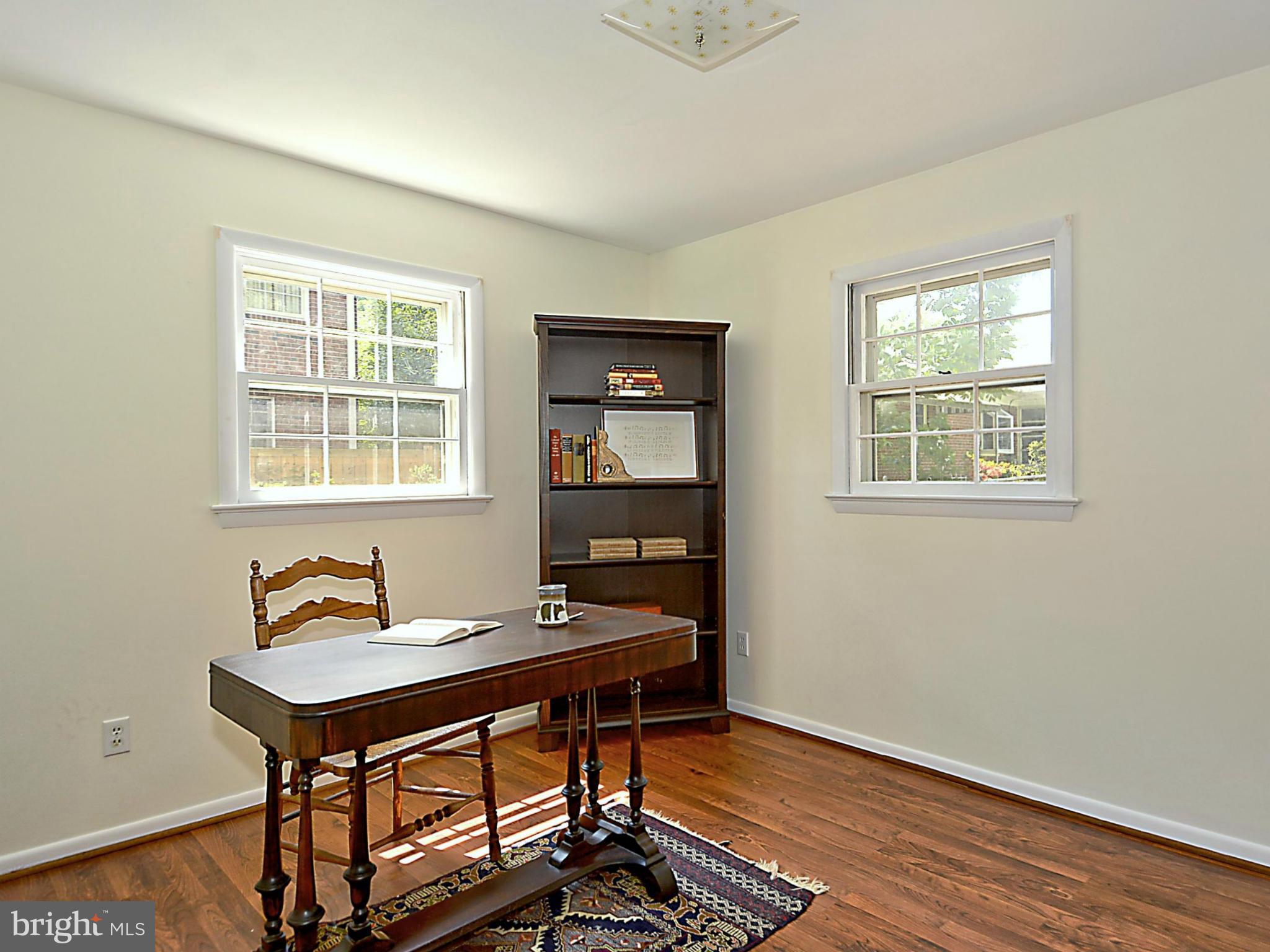 209 MacArthur Road Alexandria, VA 22305 - Photo 22 of 26 a workspace with wooden floor