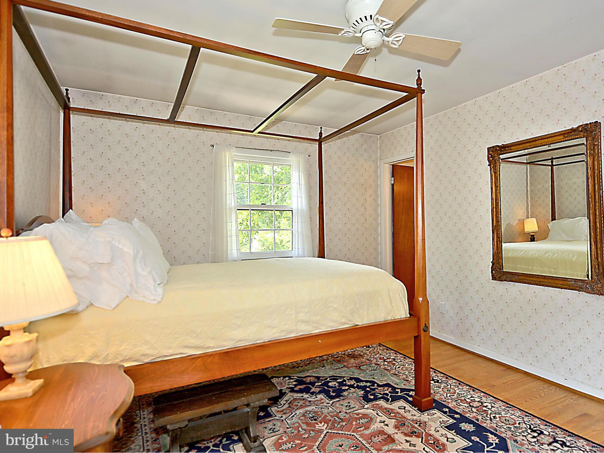 209 MacArthur Road Alexandria, VA 22305 - Photo 10 of 26 a bedroom with a bed and a window