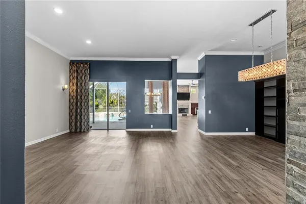 a view of livingroom with hardwood floor and a ceiling fan